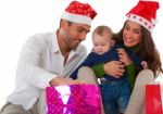 Family Celebrating Their First Christmas Together Stock Photo