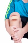 Child Knee With A Plaster (for Wounds) And Bruise Stock Photo