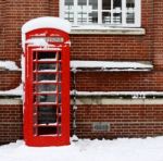 Phonebox In The Snow Stock Photo