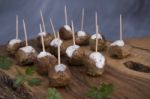 Skewers Of Meat On Wooden Cutting Board Stock Photo