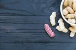 Peanuts On Wooden Background Stock Photo