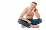 Shirtless Young Man Thinking Something Stock Photo