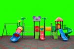 Closeup Colorful Playground With Prevent Injuries Yard On Isolated Green Background Stock Photo