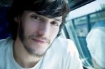 Young Man On Train Stock Photo