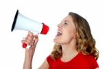 Female Holding Megaphone Stock Photo