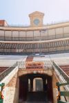 Stands With An Emergency Exit And The Ancient Clock Of A Spanish Arena Stock Photo