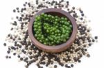 Peppercorn, Young Pepper, Green Peppercorn. Fresh Organic Harvest On Wood Bowl Stock Photo