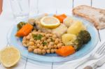 Codfish With Chickpeas And Vegetables Stock Photo