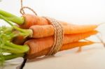 Baby Carrots Bunch Tied With Rope Stock Photo