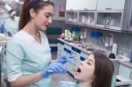 Young Woman At The Dental Office Stock Photo