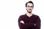 Casual Man Standing With His Arms Crossed Stock Photo