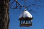 Snow Covered Birdhouse Stock Photo