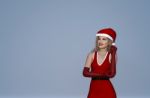 Happy Woman In Christmas Outfit Looking Up,3d Rendering Stock Photo