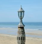 Old Lantern On Sea Beach Stock Photo