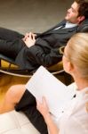 Psychiatrist Examining A Male Patient Stock Photo