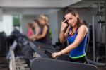 Woman Running On Treadmill Stock Photo