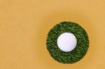 Golf Ball Edge Of Grass Field And Sand Stock Photo