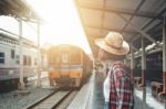 Pretty Woman Waiting The Train At Train Station For Travel In Su Stock Photo