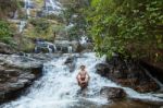 The Man Standing At Mae Ya Waterwall Stock Photo