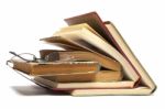 Group Of Old Books And Glasses Stock Photo