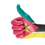 Flag Of Mozambique On Thumb Up Hand Stock Photo