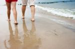 Mother And Daughter Are On The Beach Stock Photo