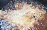 Butterfish Frying In Hot Oil Stock Photo