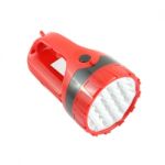 Red Plastic Pocket Flashlight On White Background Stock Photo