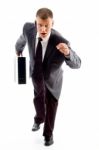 Businessman running with Briefcase Stock Photo