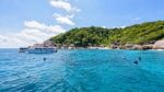 Tourists Snorkeling At The Similan Islands In Thailand Stock Photo