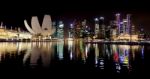 Singapore Skyline Illuminated At Night Stock Photo