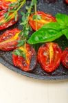 Baked Cherry Tomatoes With Basil And Thyme Stock Photo