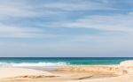 Beach, Sea And Cloudy Blue Sky Stock Photo