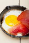 Egg Sunny Side Up With Italian Speck Ham Stock Photo