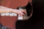 Girl Plays Piano Stock Photo