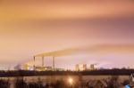 Thermal Power Plant And Cooling Towers At Night Stock Photo