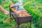 Shish Kebab Is Fried On Coals Stock Photo