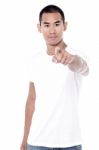 Man Pointing Front Over White Background Stock Photo