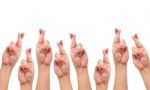 Finger Crossed Hand Sign Stock Photo