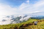 Tourists In Nature On The Mountain Stock Photo