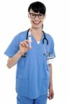 Nurse Holding Up Syringe. Ready To Be Inserted Stock Photo