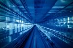 Motion Blur Of Automatic Train Moving Inside Tunnel In Tokyo, Japan Stock Photo