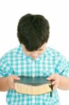 Small Boy Praying With Bible Stock Photo