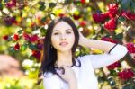 Young Beautiful Woman With Long Straight Dark Hair Posing In Spr Stock Photo