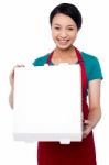 Young Chef Looking At Delicious Pizza Stock Photo