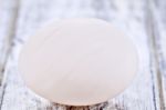 Duck Egg On White Painted Table Surface Stock Photo