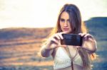 Girl With Smart Phone Near Beach Stock Photo