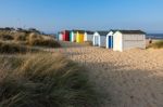 Colourful Beach Huts At Southwold Stock Photo