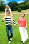 Smiling Family In Outdoors Stock Photo