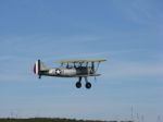 Biplane In Flight Stock Photo